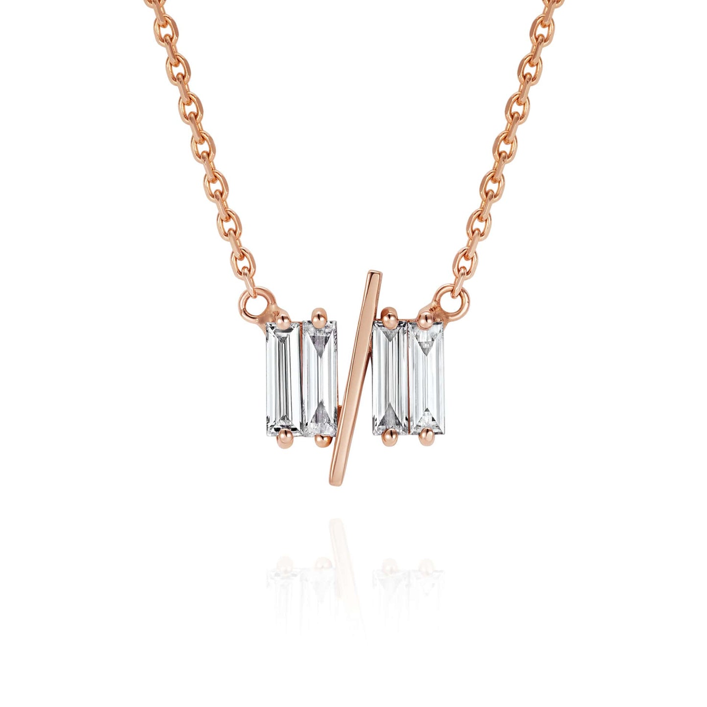 Close up of 11/11 necklace in rose gold - featuring a thin rose gold chain, 4 long thin diamonds, with a thin diagonal gold bar, to make the ‘11/11’ symbol.