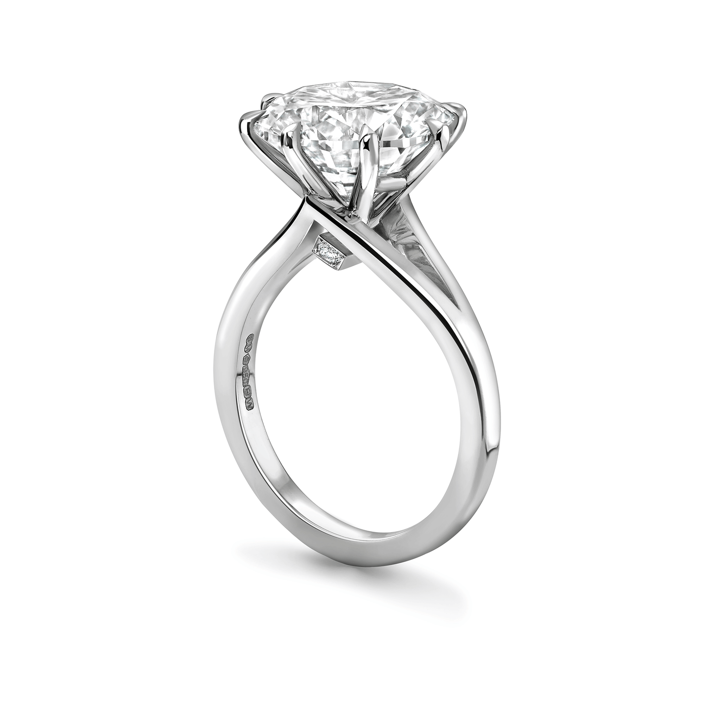 Platinum diamond ring with a white background