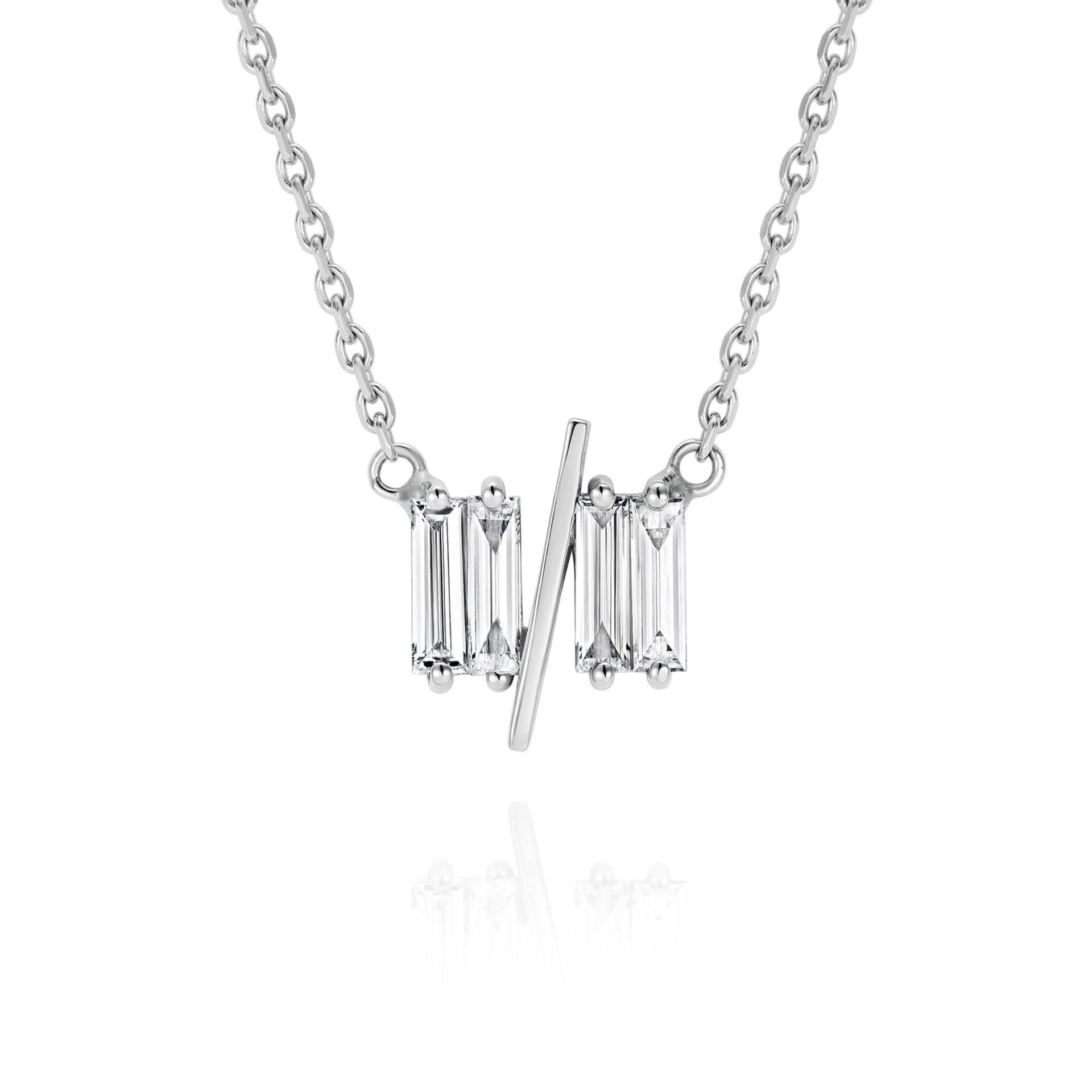 Close up of 11/11 necklace in white gold - featuring a thin white gold chain, 4 long thin diamonds, with a thin diagonal gold bar, to make the ‘11/11’ symbol.