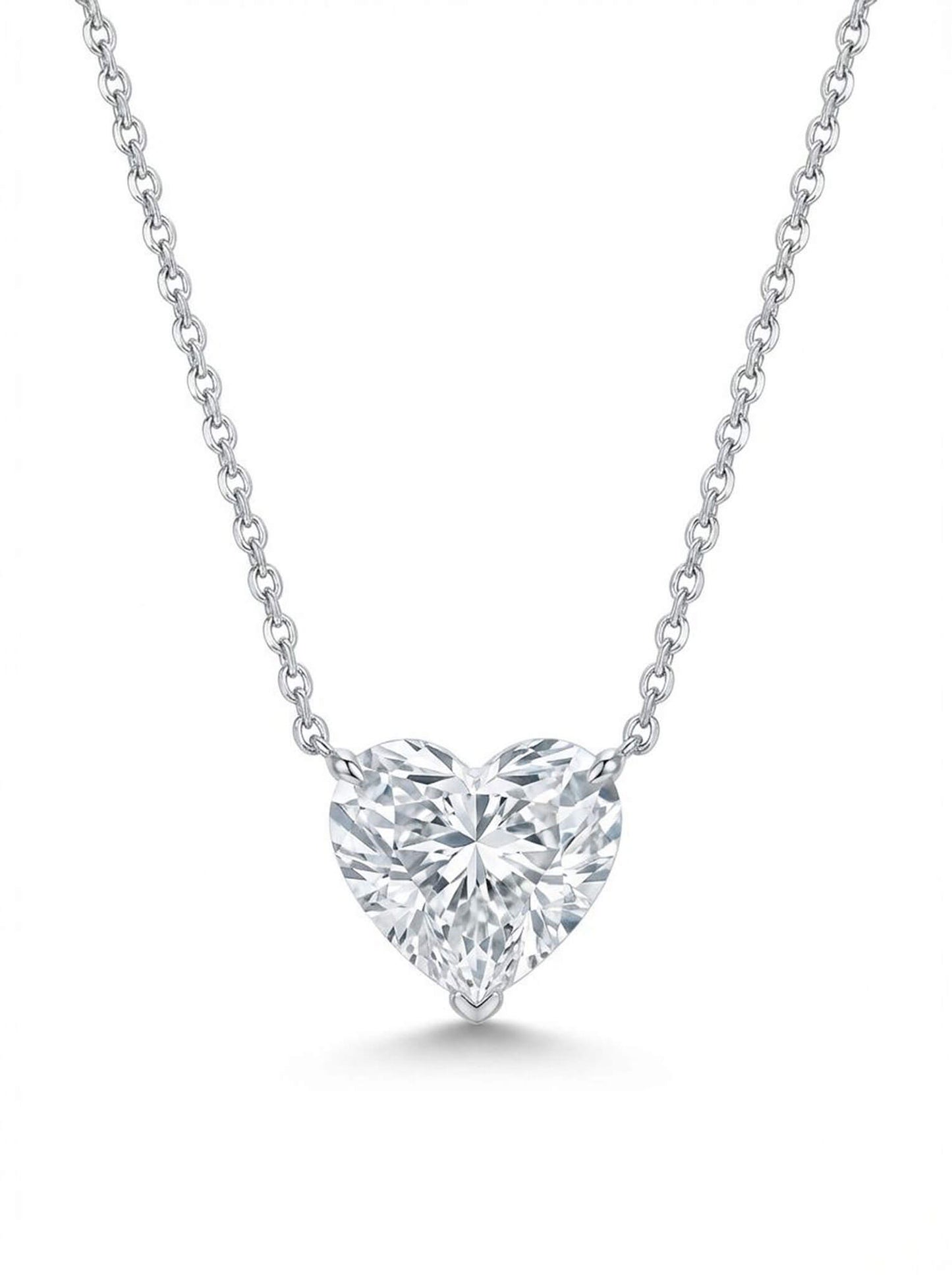 Heart-shaped diamond necklace on a white background