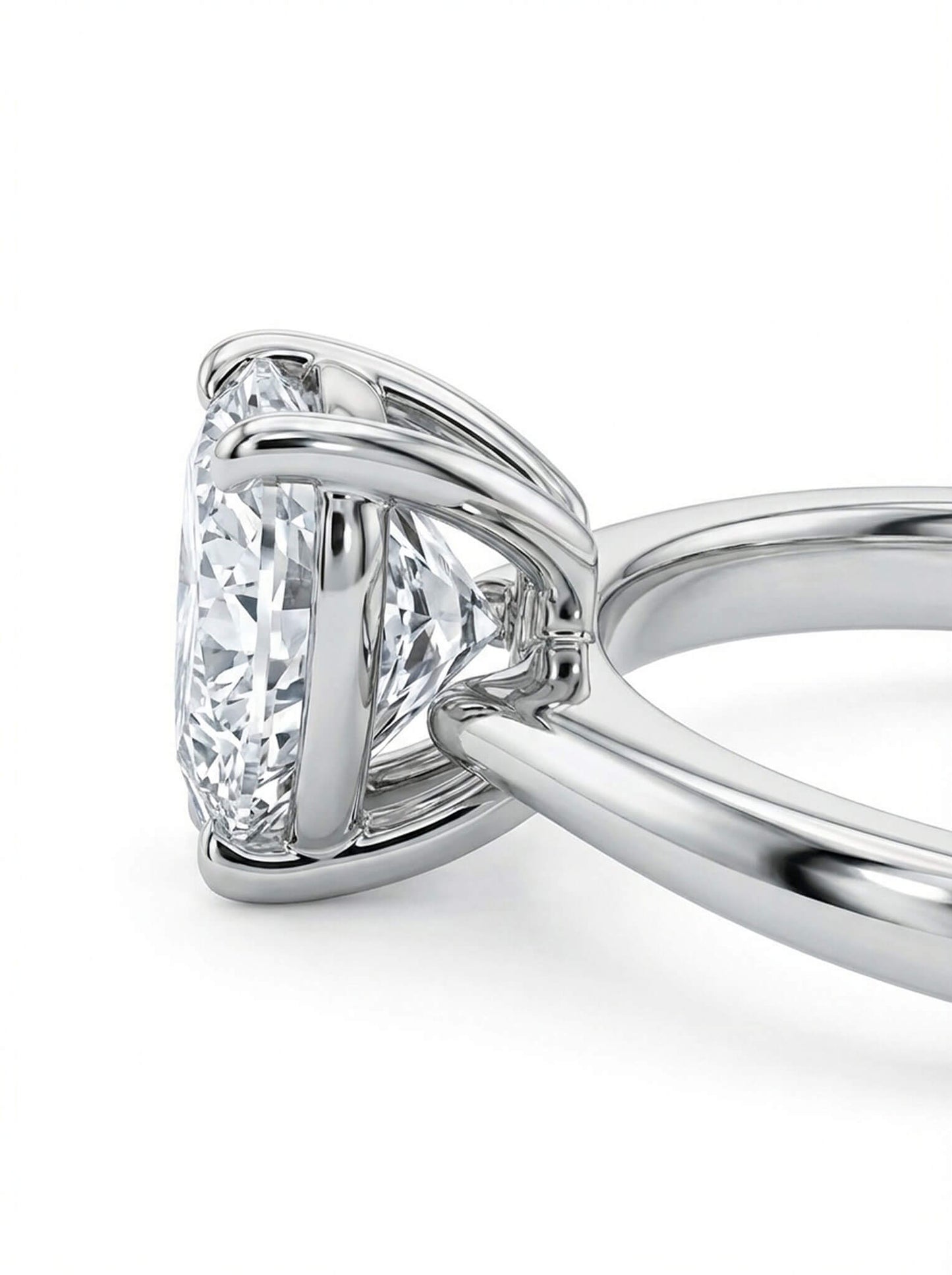 Close-up of a diamond ring with a white background