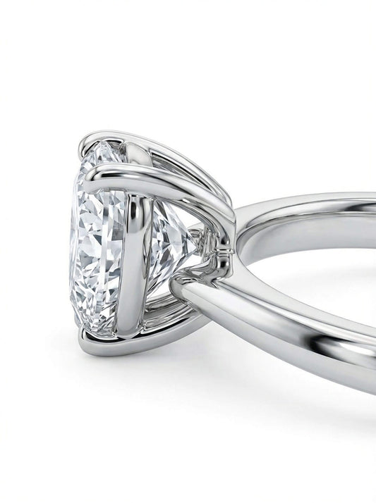 Close-up of a diamond ring with a white background