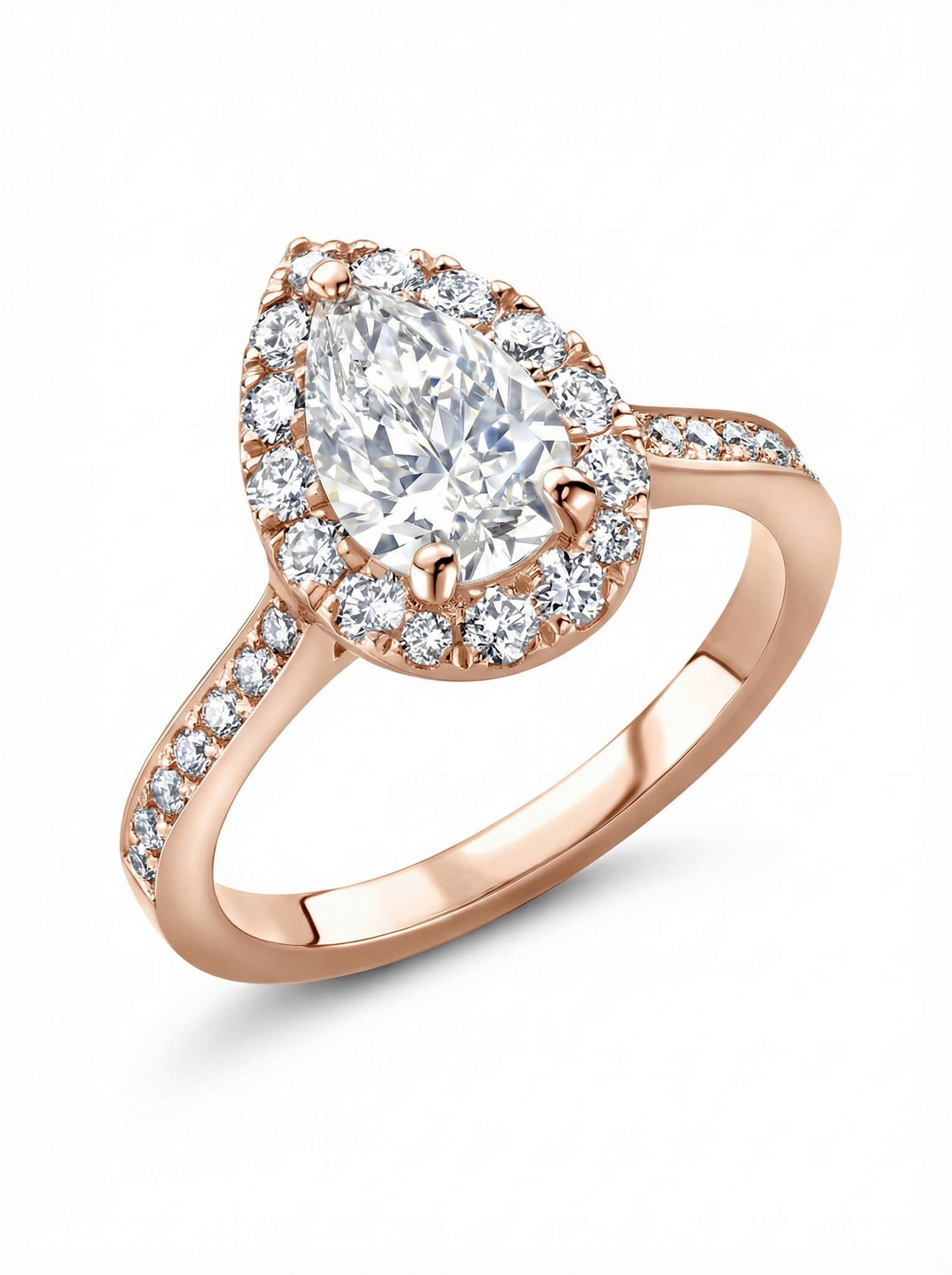 Rose gold ring with a pear-shaped diamond and smaller diamonds on a white background