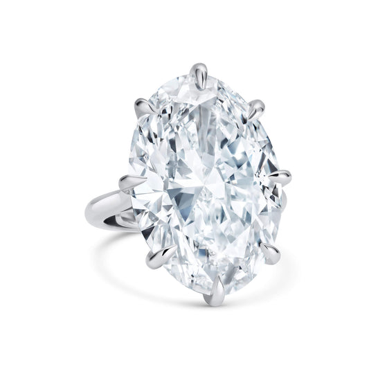 Platinum ring with very large oval diamond.